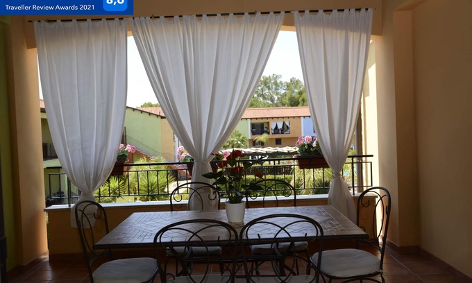 Lido Condo | AFRODITE-Elegant villa overlooking pool.