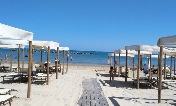 Fano Apartment | Agreement with beach, bike rental, pizzeria. Free Wifi