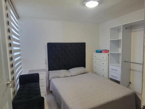 Zapopan House | Aguilas Room 1