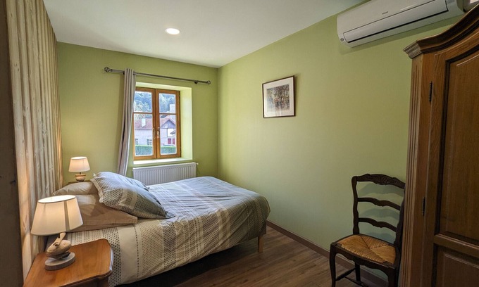 Rehaupal Bed & Breakfast | Air-conditioned family room with garden access