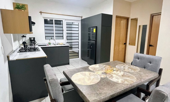 Colima House | Air-conditioned house, electric gate, covered garage, lovingly decorated.