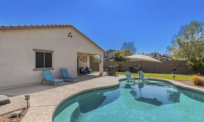 Buckeye House | Airy desert home with an enclosed yard, private pool, hot tub, firepit, & W/D