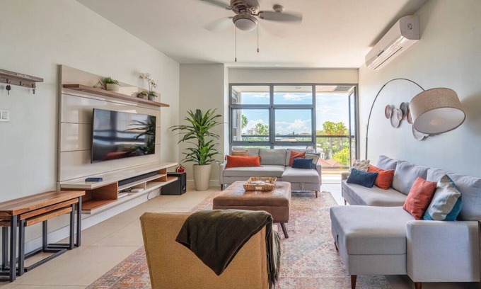Saint Andrew Apartment | Airy & modern condo with AC Gym and roof top pool