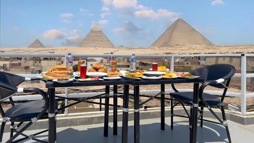 Al Haram House | AL NABELLA SCARAB pyramids view