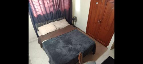 Laureles House | Alcobas con desayuno incluido baño compartido