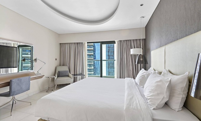 Business Bay Apartment | ALiving Luxury 2BR at Damac paramount Tower Business Bay