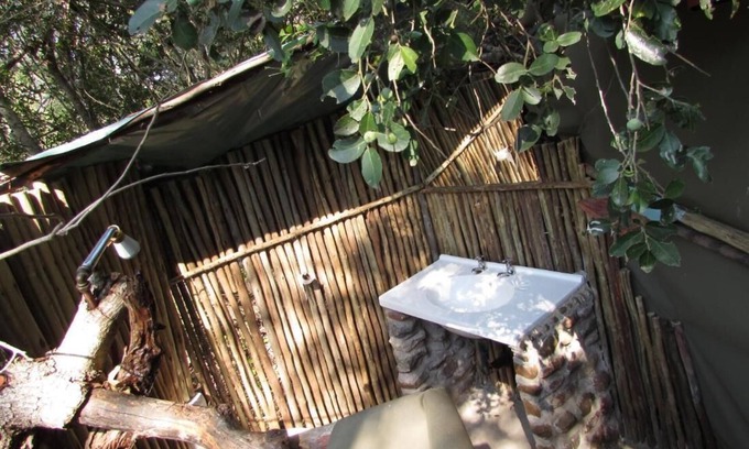 Thorny Bush Game Reserve RV Rental | Amanzimlotzi Riverside Bush Tent for 3 Adults in Limpopo, Kruger Park