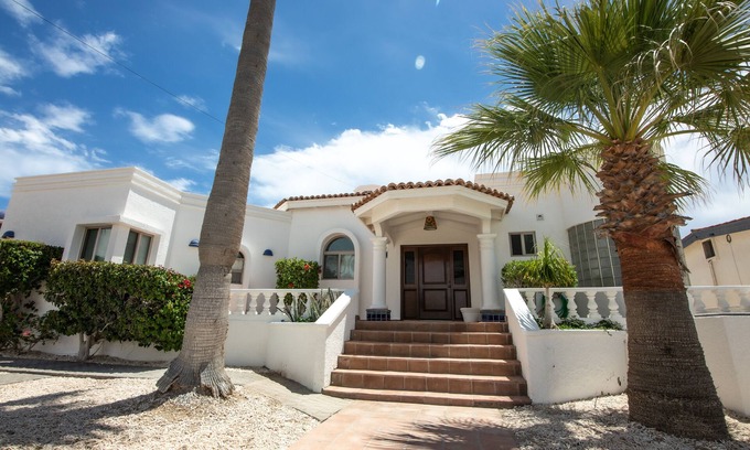 Las Conchas House | Amazing Las Conchas Beach Front with Heated Spa & Kayaks!
