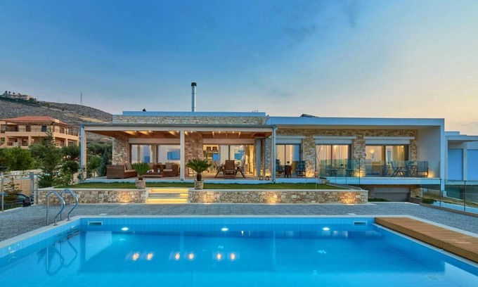 Vathianos Kampos Villa | Amazing location and views with a heated covered pool