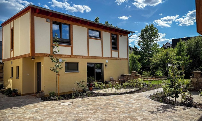 Hofheim in Unterfranken House | Amber Ferienhain - House 'Magnolie' with enchanted garden & private sauna