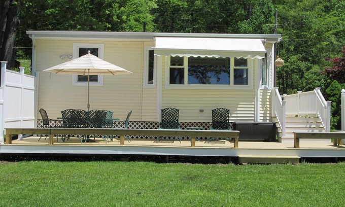 Lebanon House | Amston Lake waterfront home, aluminum boat with electric motor provided