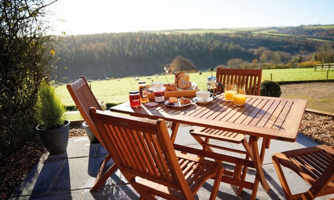 Ash Mill Cottage | An open plan cottage with a private patio with views of the countryside.