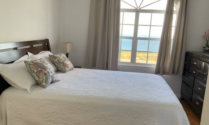 Cockburn Town Villa | Anglor@ Breezy Brae-Ocean View 2/2 bed and bath-minutes from the beach.