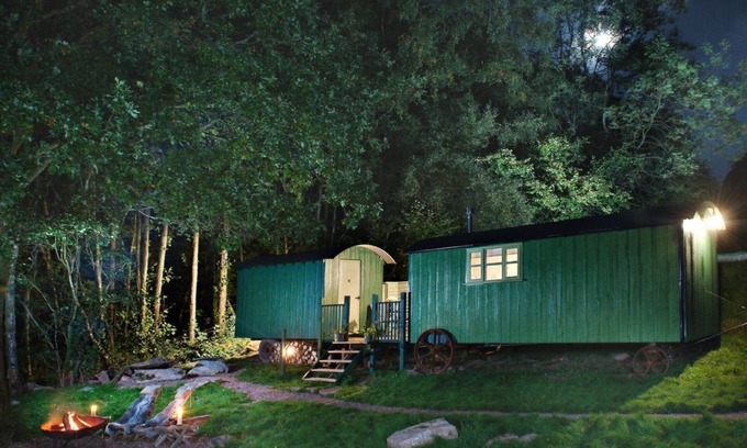 Tintern Cabin | Anne's Hut offers a romantic retreat for two in two interlinked shepherd's huts with decking area an