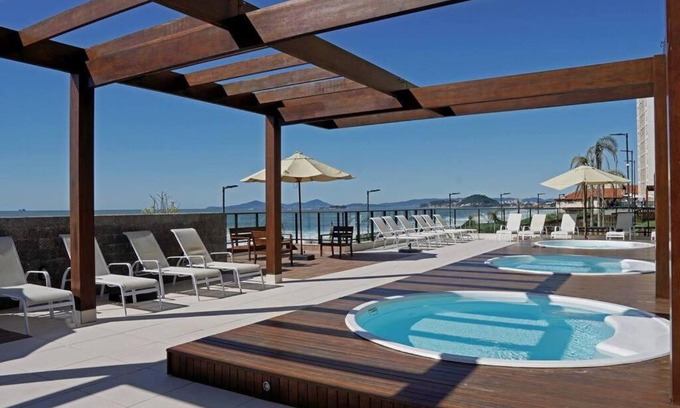 Barra Velha Apartment | Apê pé na areia com vista mar e próximo ao Beto Carrero - Condomínio Vila Açoriana