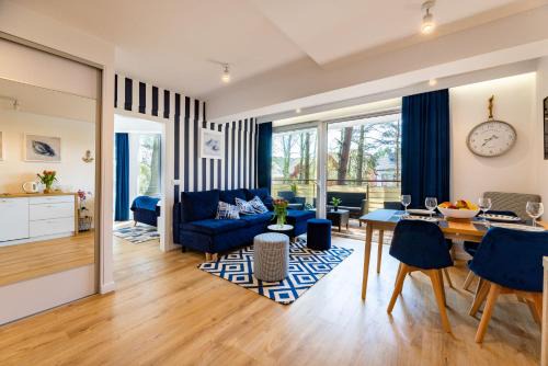 Poddabie Apartment | Apartament 21B Niebieskie Apartamenty Poddąbie z basenem krytym, odkrytym, salą zabaw, animacjami