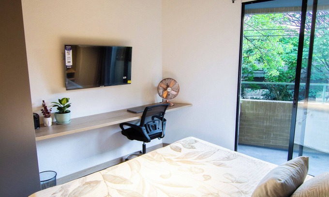 Suramericana Hotel | Apartamento Acogedor con Balcón