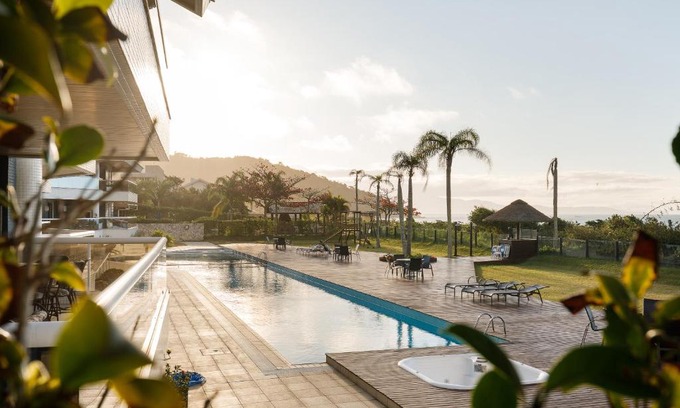 Lagoinha Apartment | Apartamento com 4 suítes pé na areia