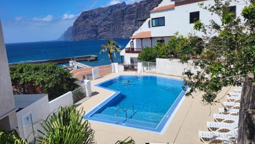 Los Gigantes Apartment | Apartment mit Sonnenterrasse und Panorama - Meerblick, 5 Min. von Hafen + Strand
