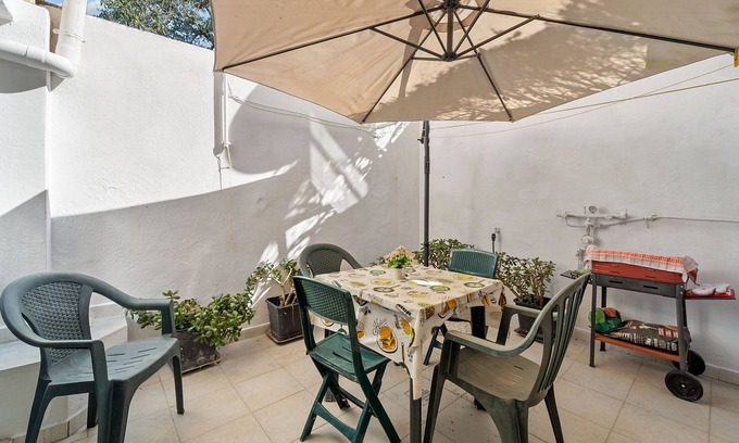 Iglesias Apartment | Apartment 'Amelia' with Private Garden, Wi-Fi and Air Conditioning