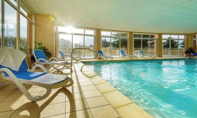 Sables-d'Or-les-Pins Apartment | Apartment 'Appartement Au Cap Green' with Shared Garden, Balcony and Wi-Fi