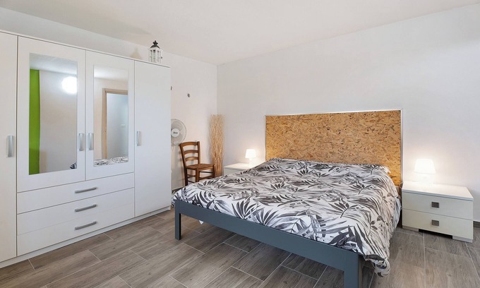 Arona Apartment | Apartment 'Bambù' with Private Garden, Balcony and Wi-Fi
