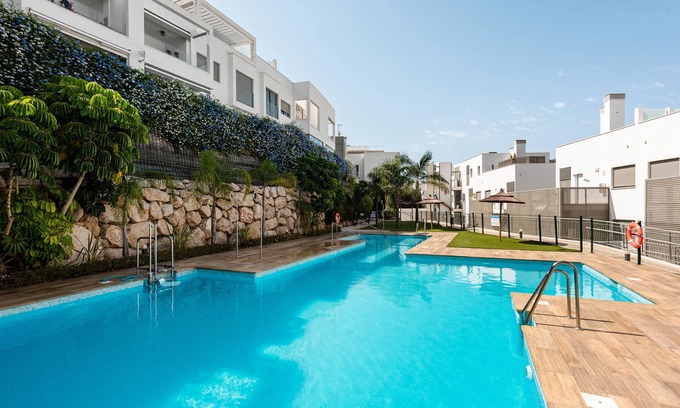 Caleta de Velez Apartment | Apartment 'Baviera Hills 1A' with Garden, Shared Pool & Wi-Fi