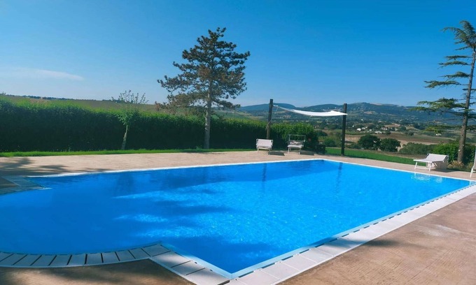 Cingoli Villa | Apartment by Lake with Garden Views
