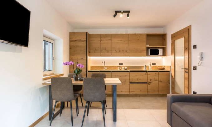 San Lorenzo in Banale Apartment | Apartment 'Campanile Basso' with Mountain View, Balcony & Wi-Fi
