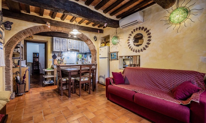 Orbetello Apartment | Apartment 'Casa Vacanze Santa Clara' with Shared Terrace, Wi-Fi and Air Conditioning