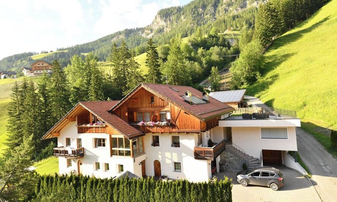 La Valle Apartment | Apartment "Ciasa Mirio Armentara" with Mountain View, Wi-Fi & Garden