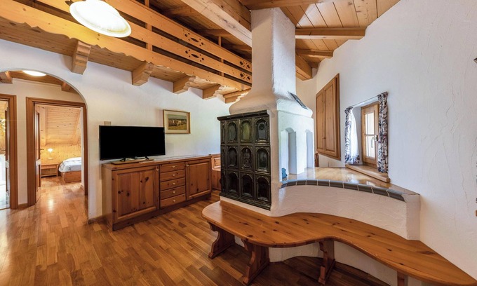 Vigo di Fassa Apartment | Apartment "Ciasa Sommavilla Mansarda" with Mountain View, Shared Garden & Wi-Fi
