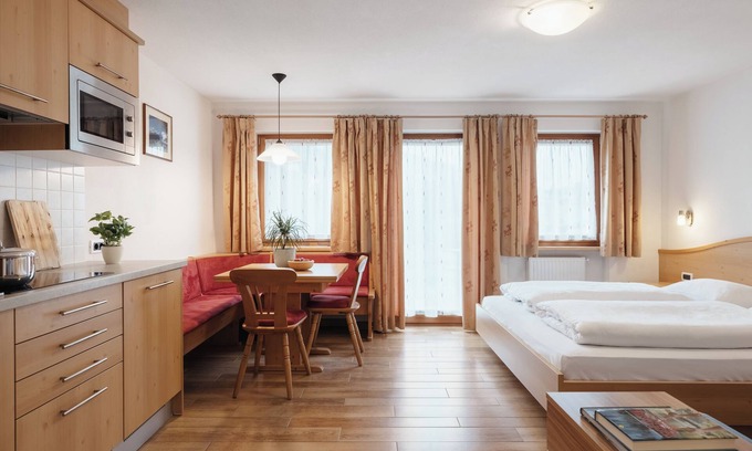 Badia Apartment | Apartment "Ciasa Willy Lavarella" with Mountain View & Wi-Fi