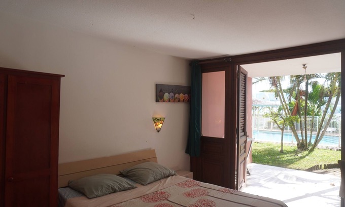 Sainte-Anne Apartment | Apartment Dahlia (500 m from the Pointe Marin BEACH, with SWIMMING POOL)