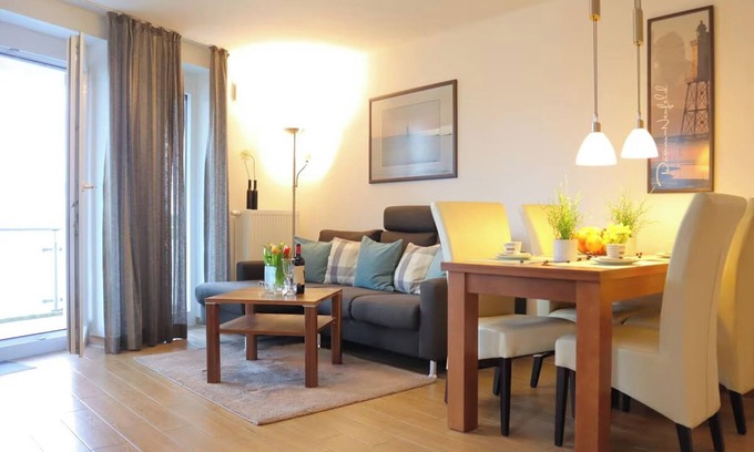 Wurster Nordseekuste Apartment | "Apartment Sonnenbogen: North Sea magic and comfort on the dike!"