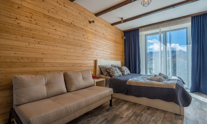 Dusheti Apartment | Apartment decorated with a lots of wood, with breathtaking view on mountain