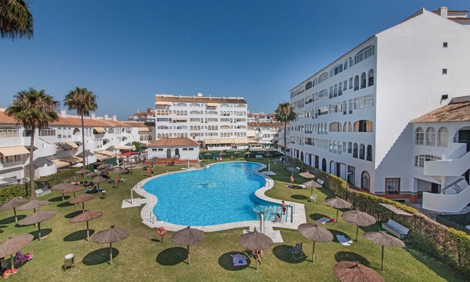 El Portil Apartment | Apartment 'El Portil' with Shared Pool, Wi-Fi and Air Conditioning