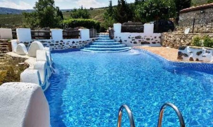 La Torre d'En Besora Apartment | Apartment 'Cau' with Mountain View, Shared Pool and Private Terrace