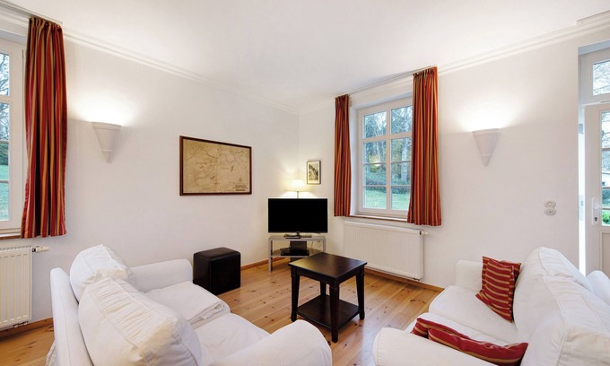 Gingst Apartment | Apartment 'Gut Rattelvitz - Parterre Ost' with Sea View, Private Terrace and Wi-Fi