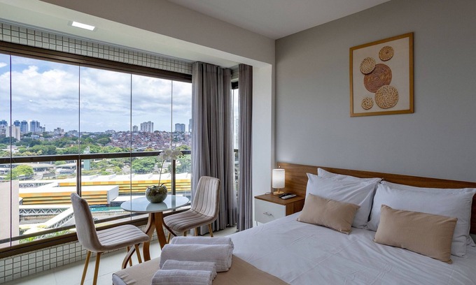Caminho das Arvores Apartment | Apartment in Building with Pool and Fitness Center
