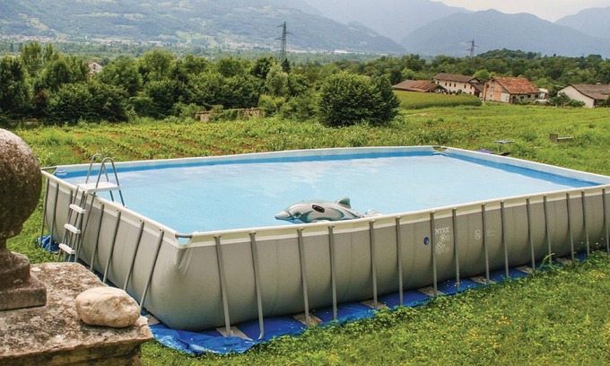 Santa Giustina Apartment | Apartment in Valbelluna with Pool & Dolomites View