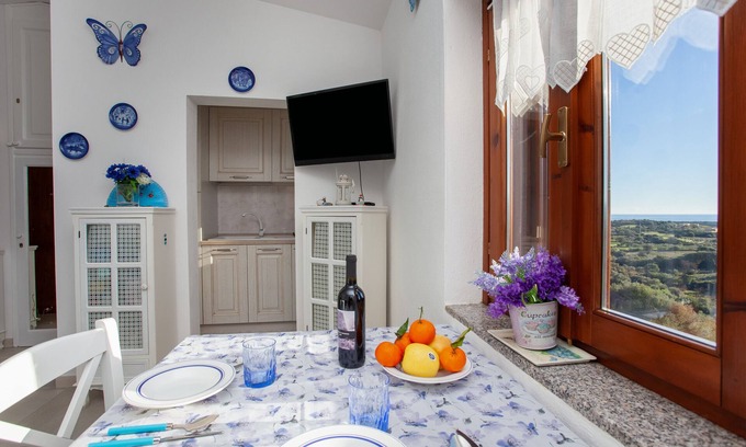Agrustos Apartment | Apartment "La Finestra sul Mare" with Sea View, Private Terrace & Wi-Fi