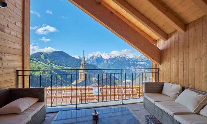 Huez-en-Oisans Apartment | Apartment 'La Grange' with Mountain View, Private Terrace and Wi-Fi
