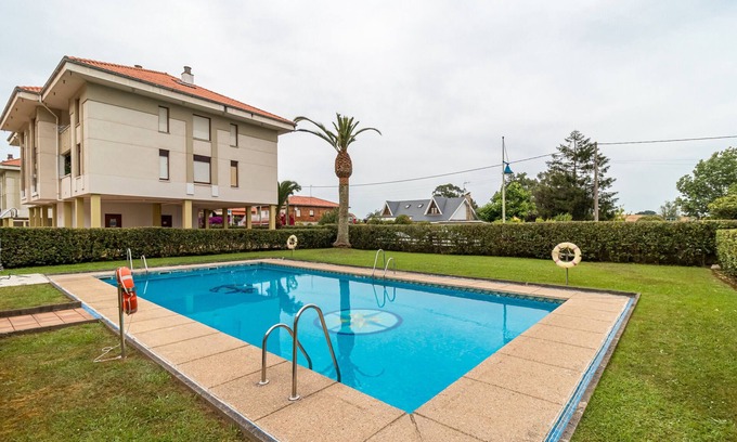 Suances Apartment | Apartment 'La Ribera' with Mountain Views, Shared Pool and Wi-Fi