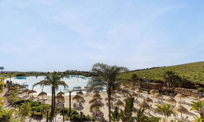 Casares Apartment | Apartment "Lagoon Suites" with Sea View, Shared Pool & Wi-Fi