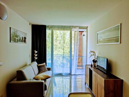 Eraclea Mare Apartment | Apartment Mare45 - 10 minutes walk from the beach with one private ombrella and two sun-beds
