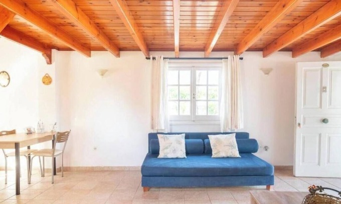 Ag. Georgios Apartment | Apartment 'Niovi One-Bedroom Bungalow - Split' with Shared Pool, Wi-Fi and Air Conditioning