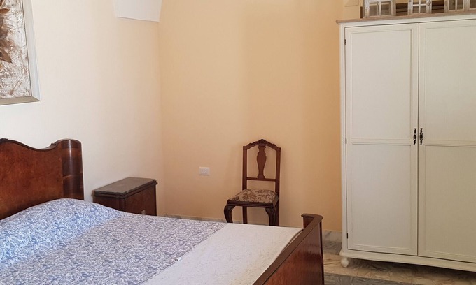 San Donato di Lecce Apartment | Apartment 'Palazzo Costantini - Gerbera' with Shared Terrace, Wi-Fi and Air Conditioning