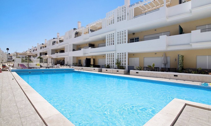 Cabanas Apartment | Apartment 'Royal Cabanas Beach 145' with Shared Pool, Shared Garden and Air Conditioning