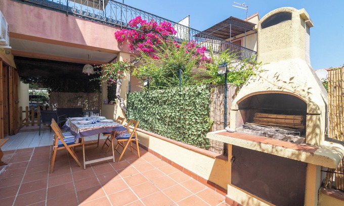Porto Ottiolu Apartment | Apartment 'Soffio Di Mare' with Private Terrace, Private Garden and Air Conditioning